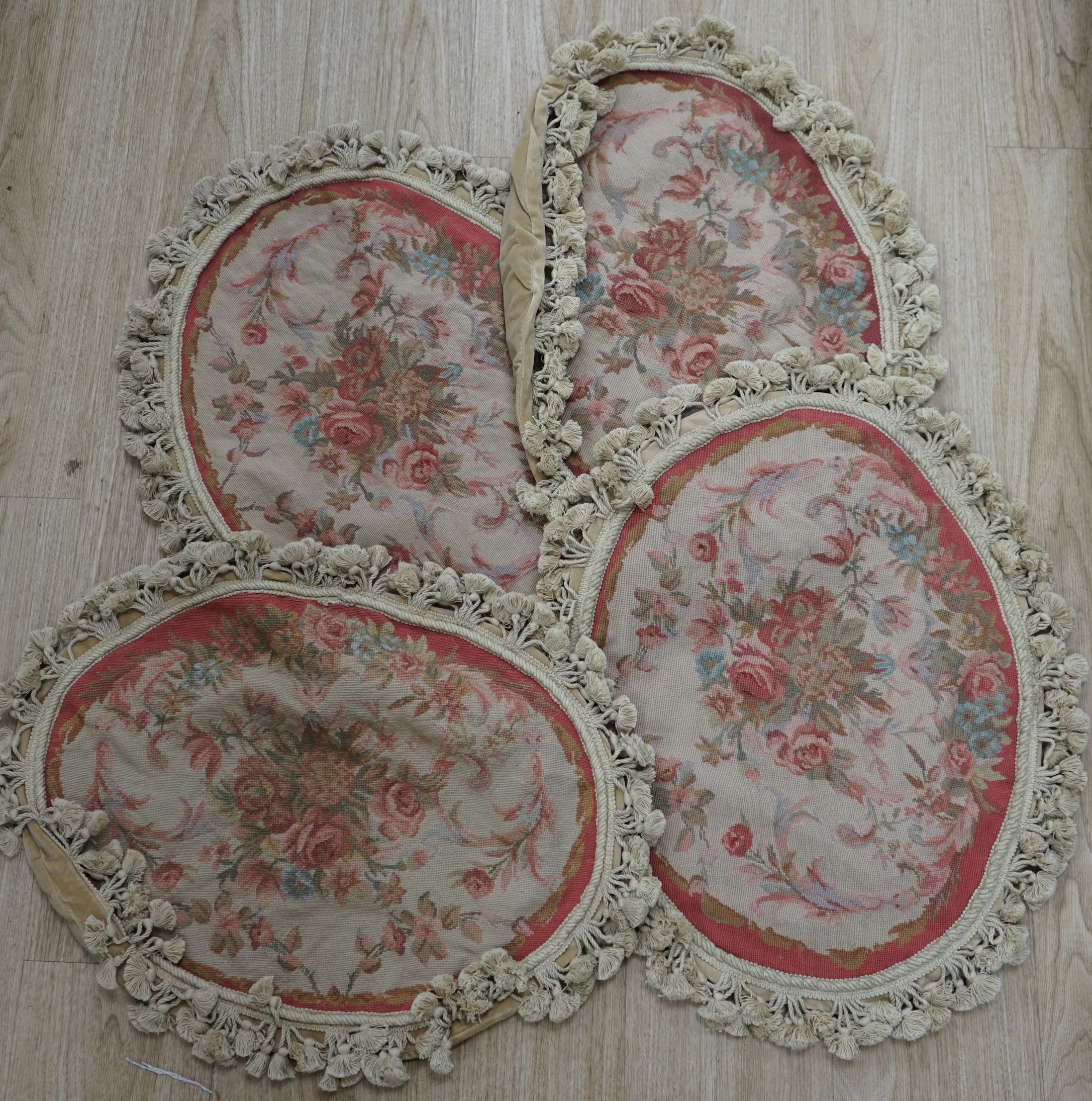 Four small fruit design woolwork cushion covers. Condition - fair, wear and fading commensurate with age